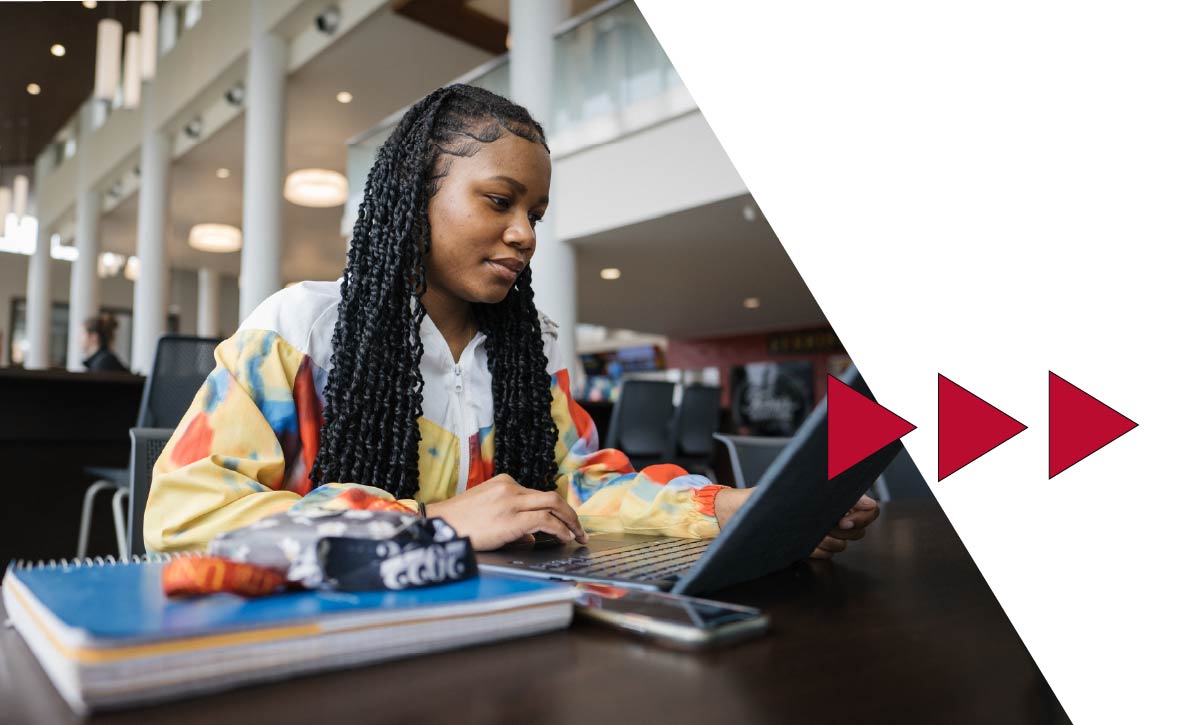ferris state university student studying on a laptop