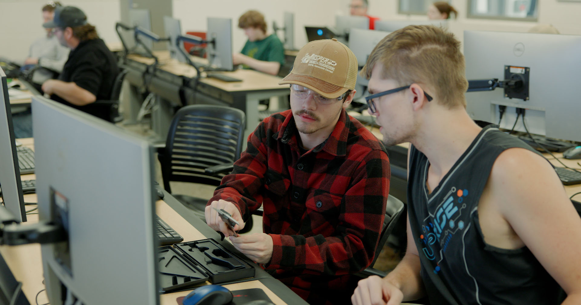 ACEBootcamp attendees working at Ferris State’s College of Engineering Technology.