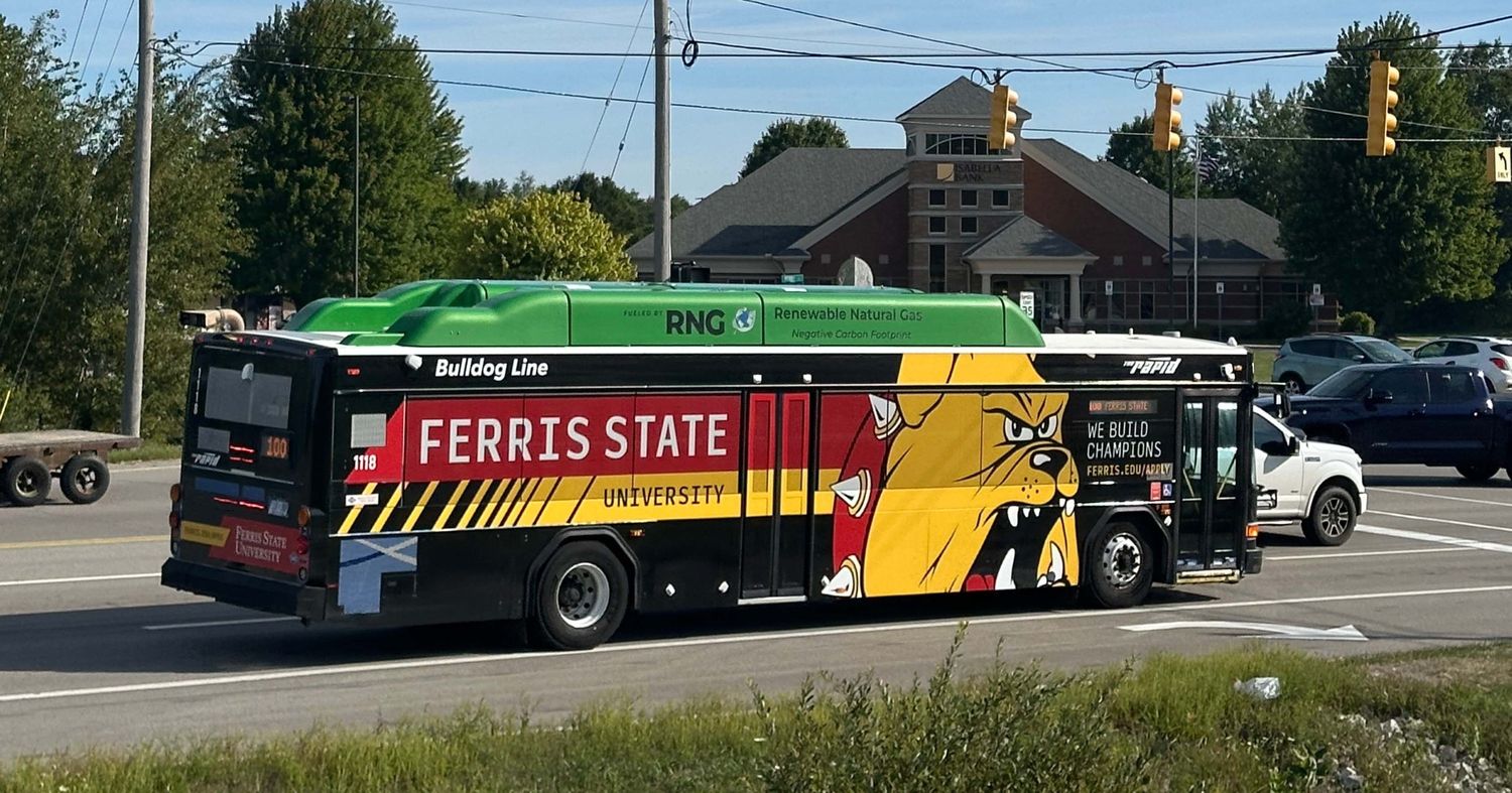 Photo of a Bulldog Line bus with Ferris State University decal wrapped around its entirety