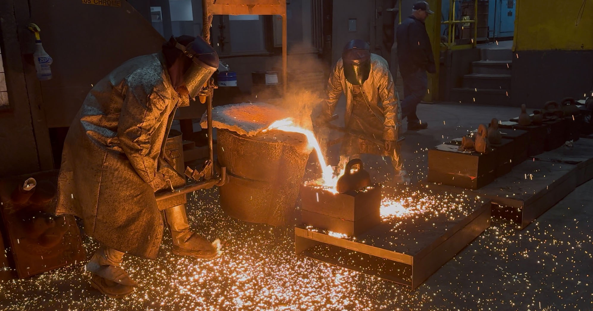 Competitors in Cast in Steel making their creations.