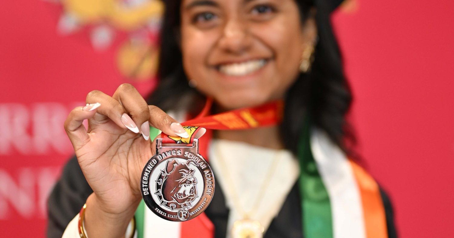 Close-up shot of the Determined Dawgs medallion