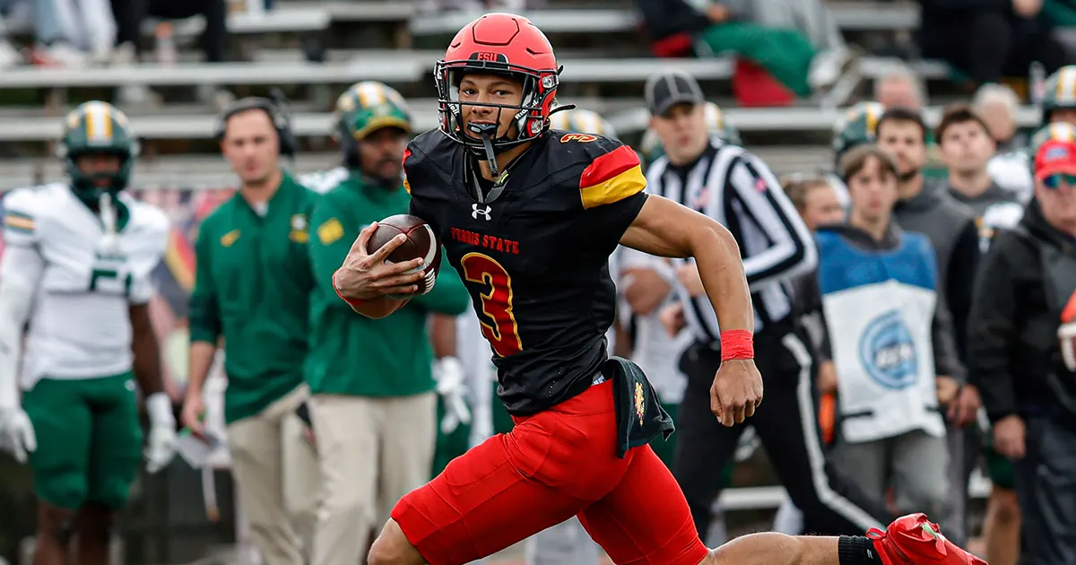 football player running with the ball