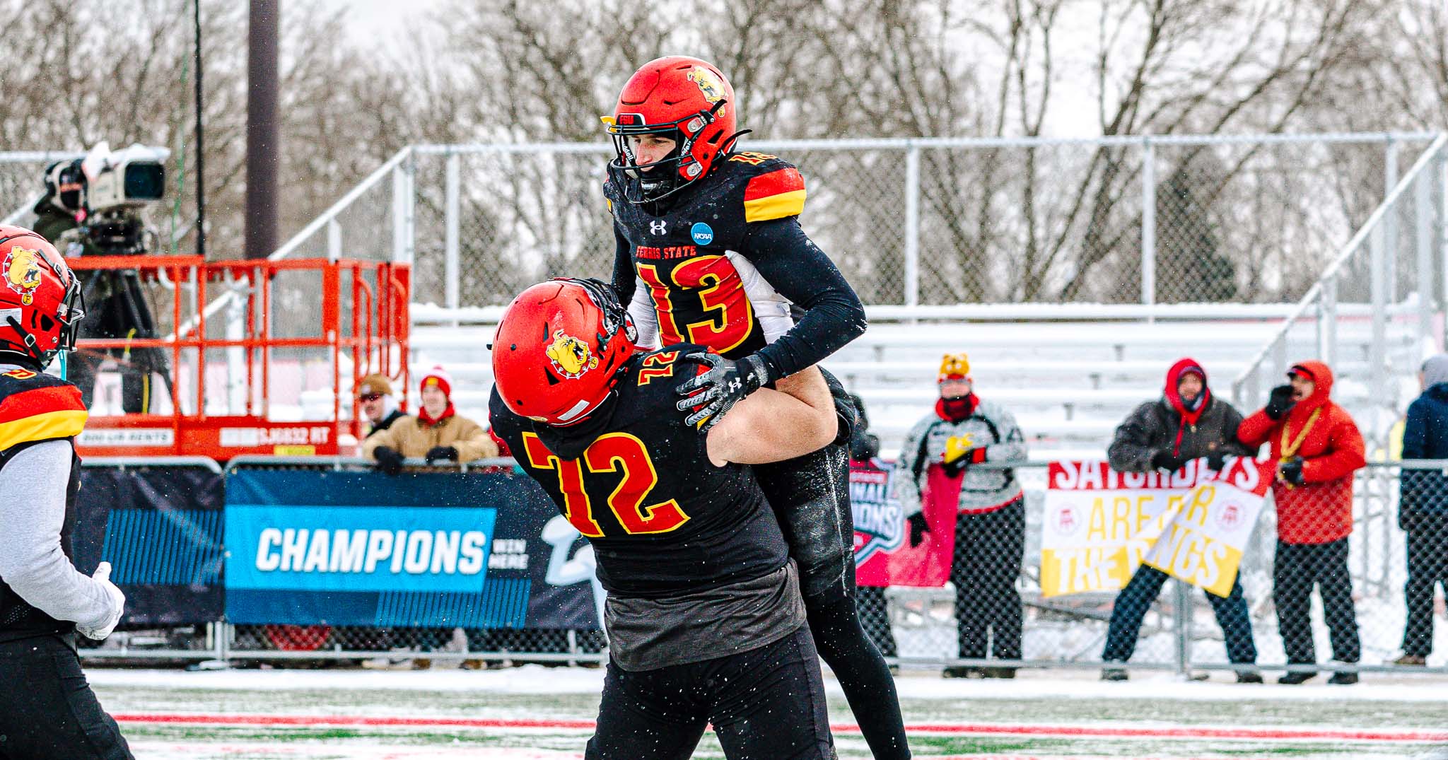 Tarick Bower (#13) celebrating with Tim Anderson (#72)
