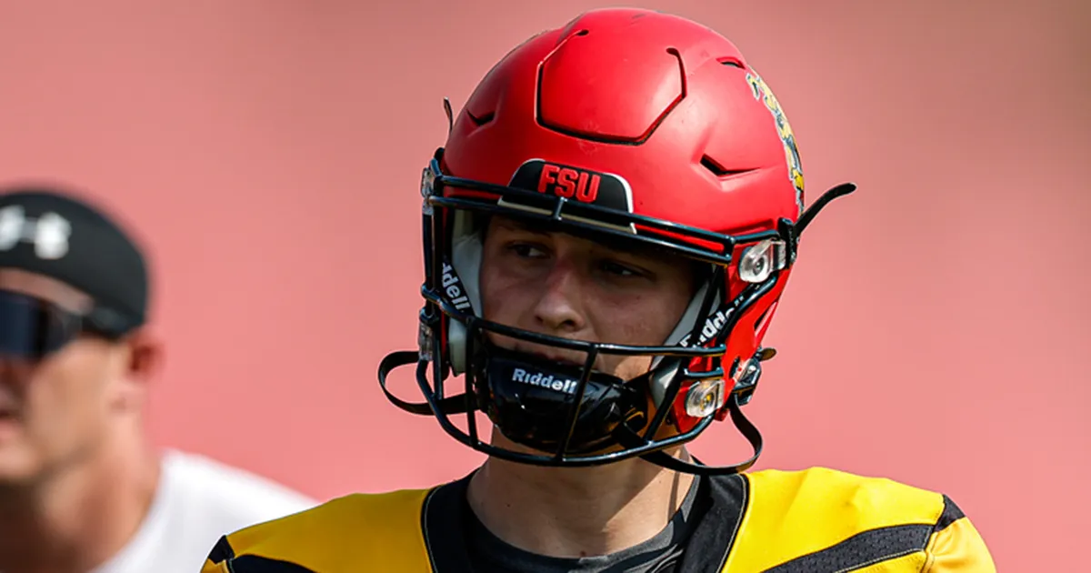 a football player wearing a helmet