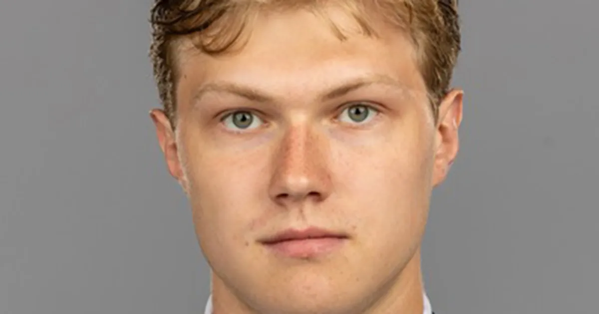 headshot of a hockey player