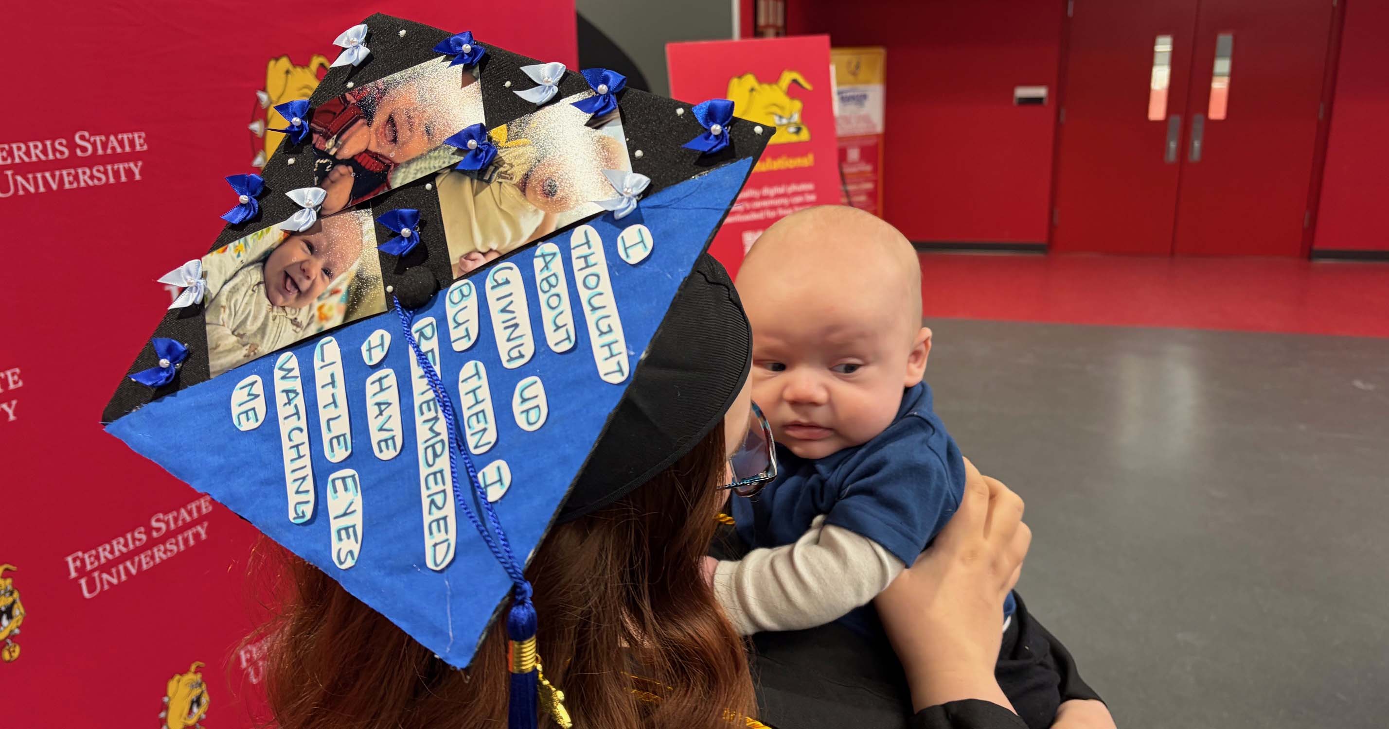 Photo of Olivia Rey holding her child