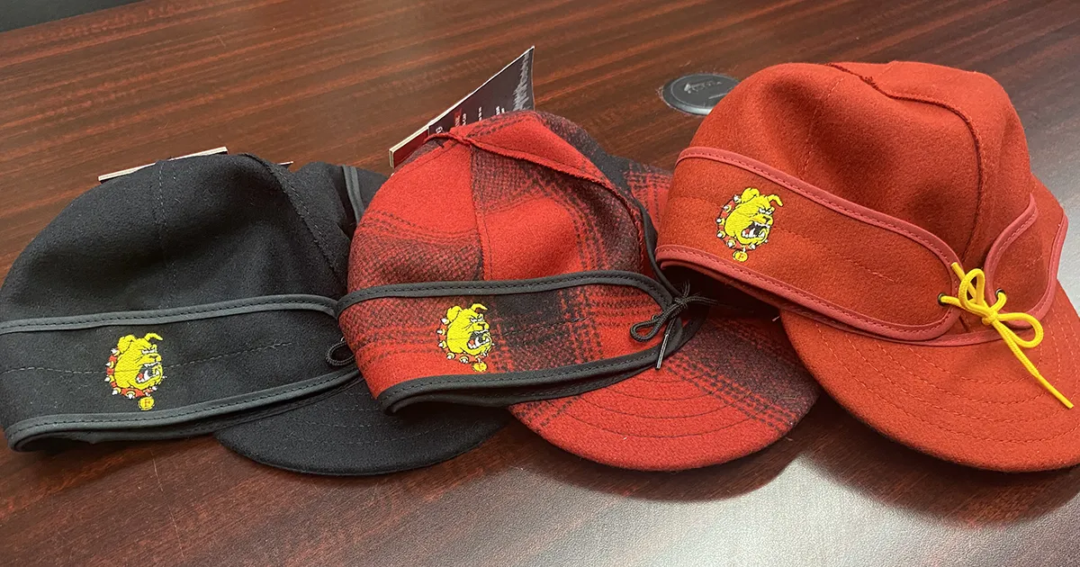 three stormy kromer hats with brutus embroidered on the side