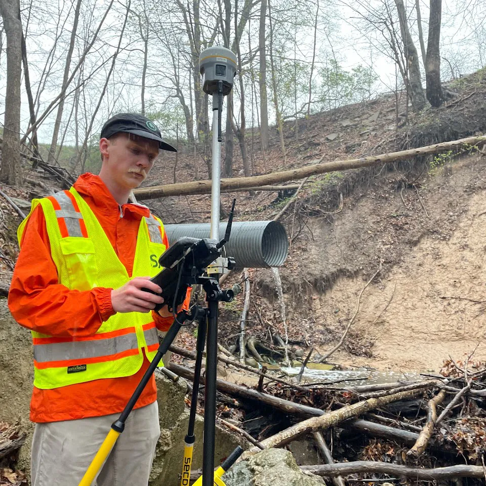 student working in the field