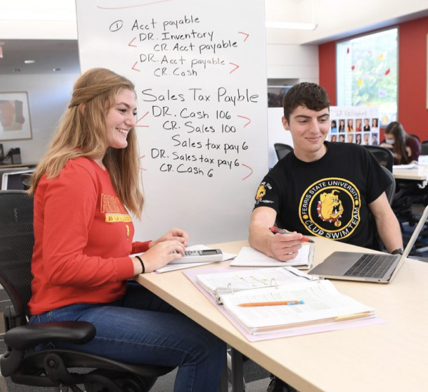 Students working together in a classroom setting