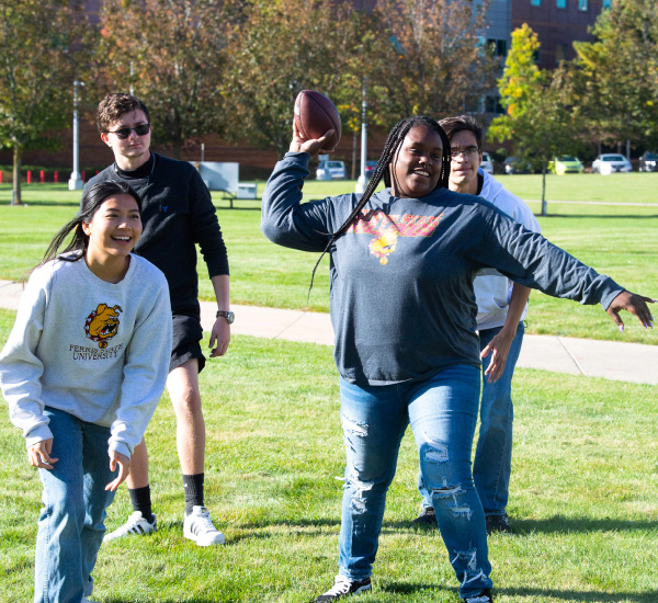 Students playing with a football