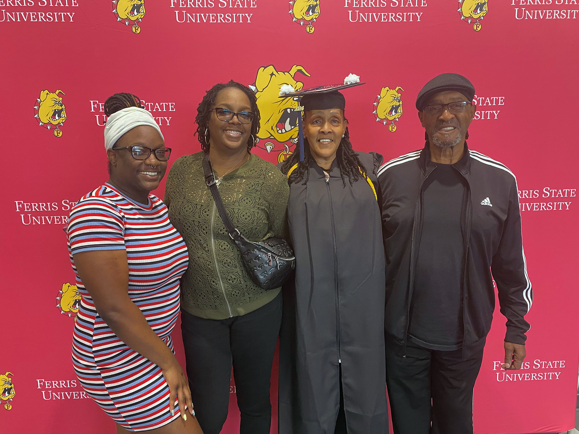 Wilhelmina Collier with family at commencement at Ferris State University