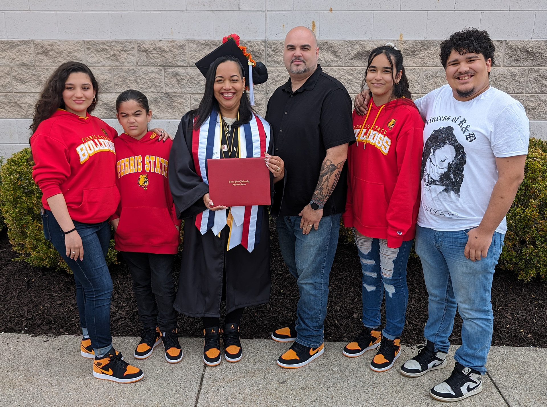 Massiel Calderon with her family after her graduation in May 2024
