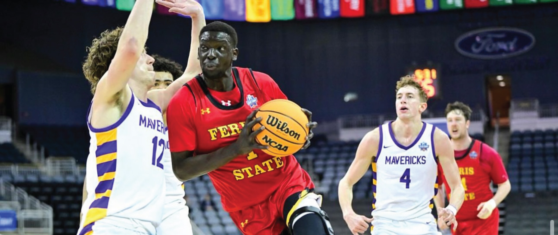 Deng Reng in Men's Basketball Elite Eight game.