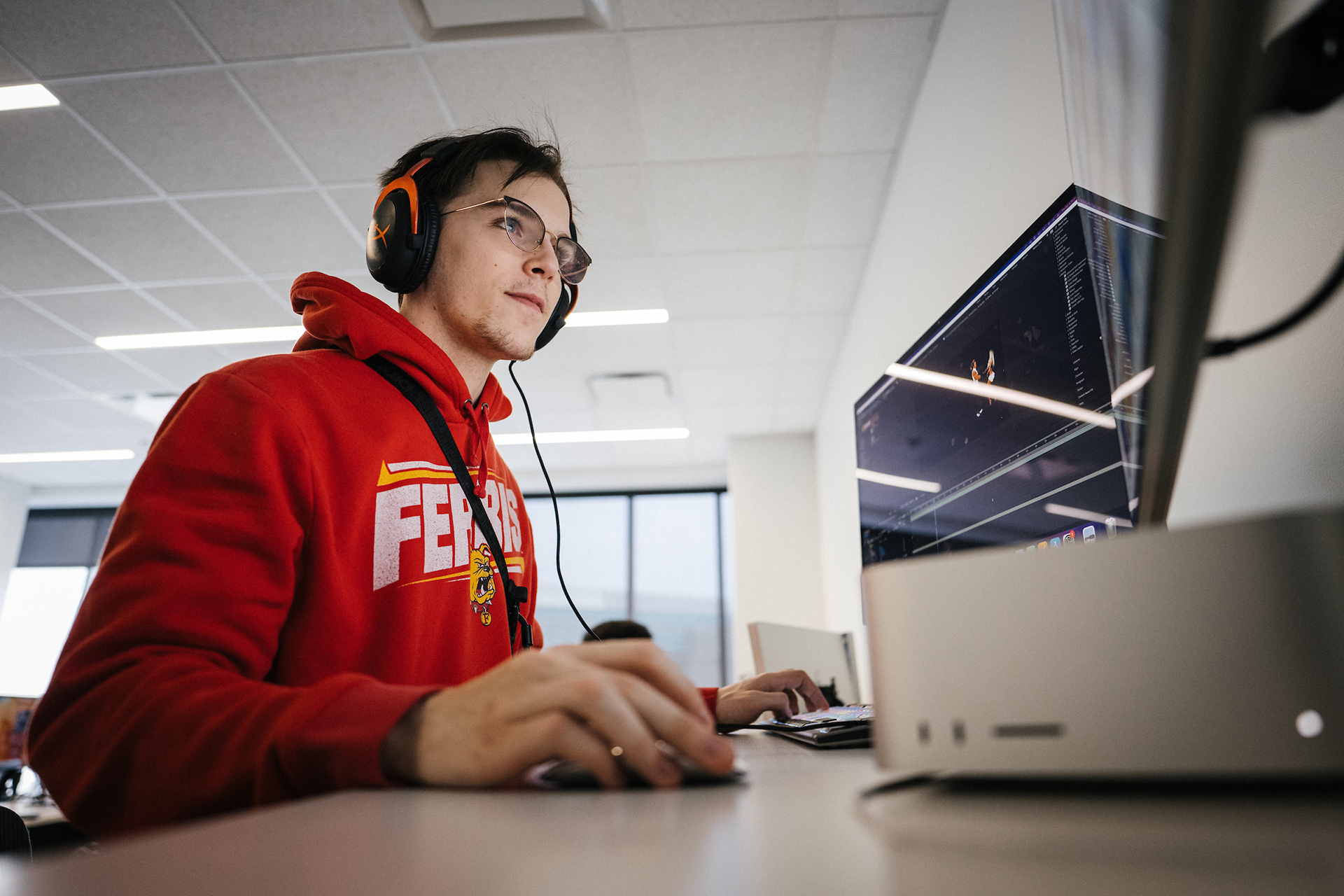 A Ferris State University student in a classroom is pictured