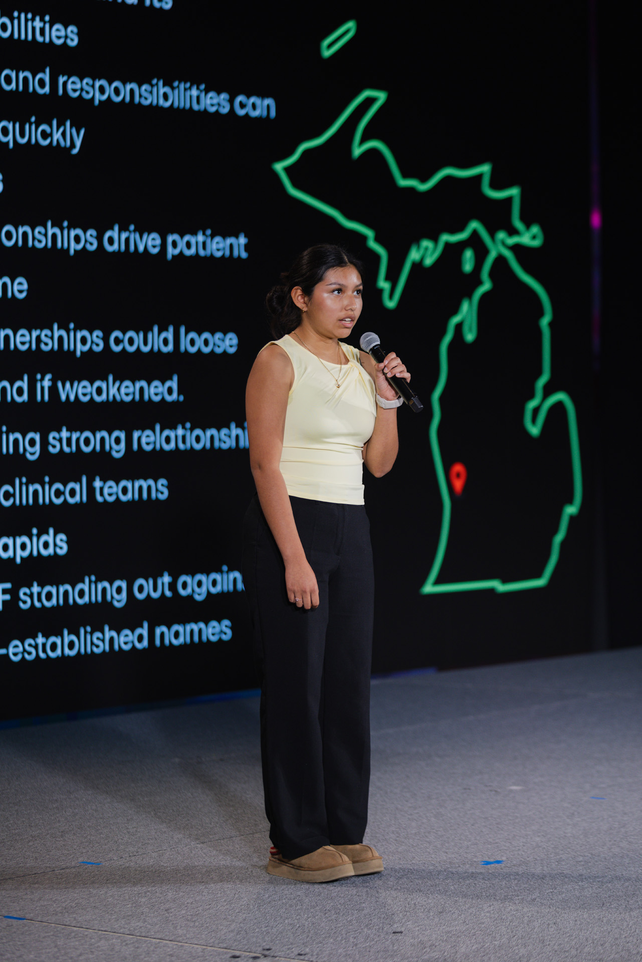 Catholic Central High School student Citali Rodriguez and team presenting at the FutureSolve 2025 final event