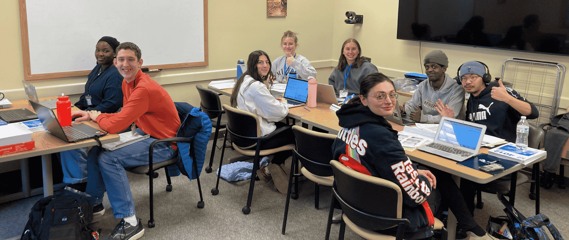 group of students at a desk