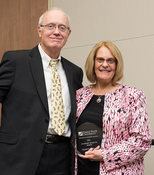 Paul Jackson, left, and Nancy Hogan, right