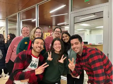 Group of people posing for the camera