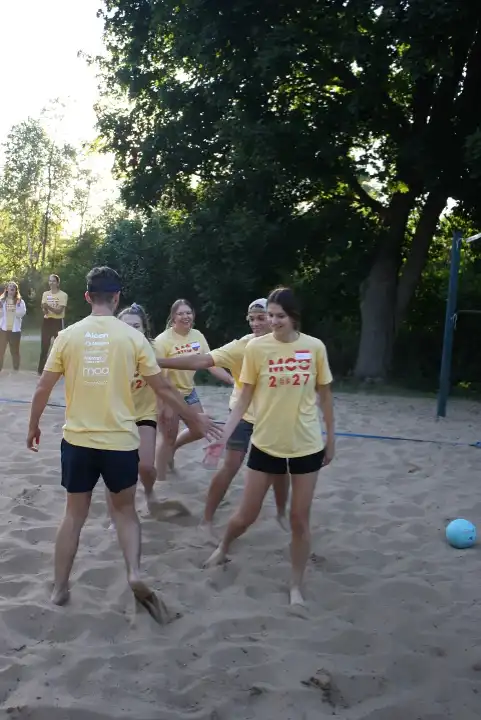 Students playing volleyball