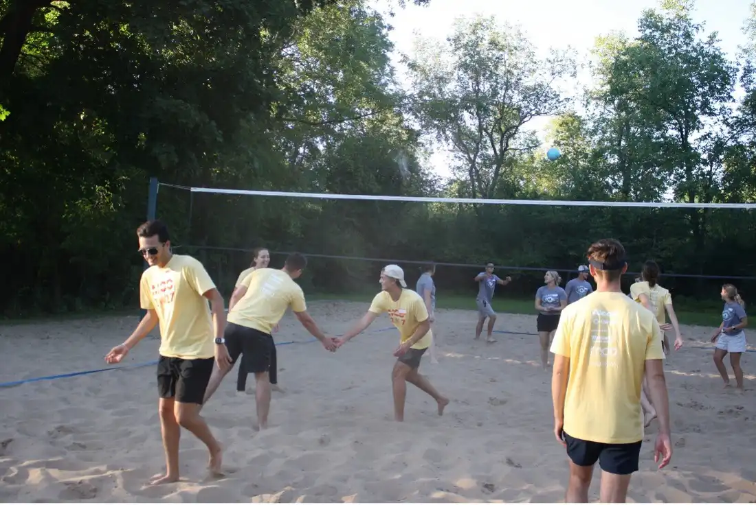 Students playing volleyball