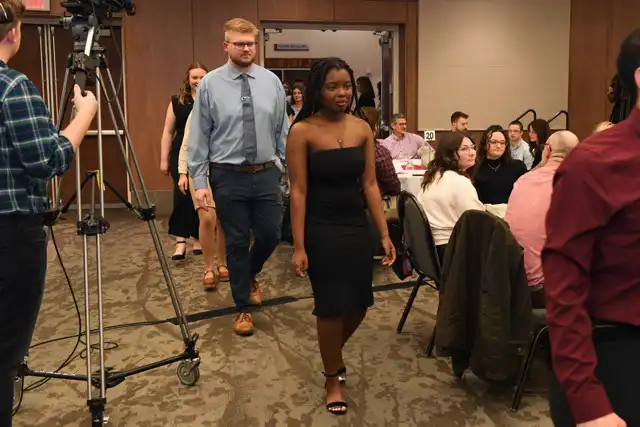 People entering the ballroom