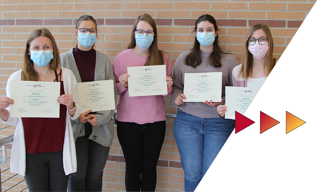 Students posing with certificates of AAO fellowship