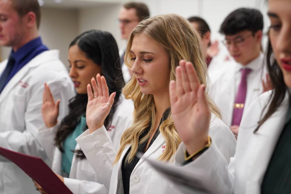 Student reciting oath
