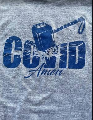 T-shirt with Covid being broken by a hammer and the word "Amen"