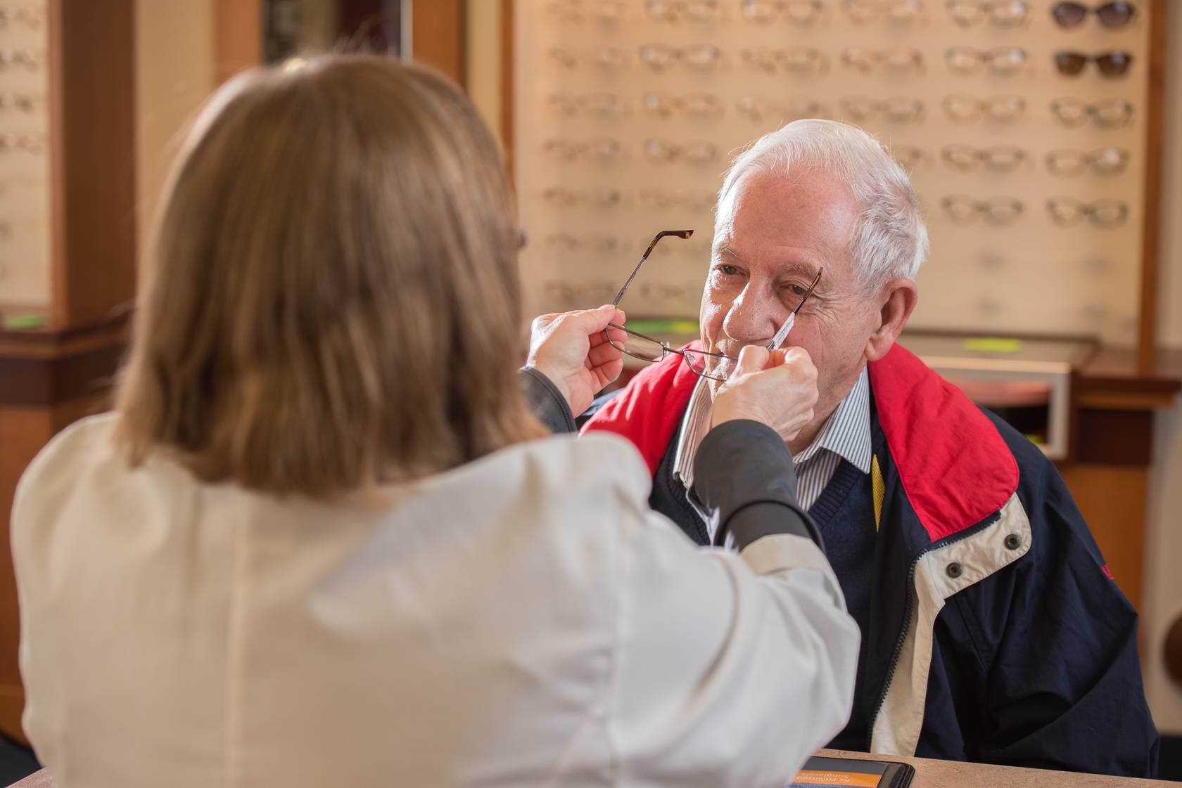 Patient tries on glasses