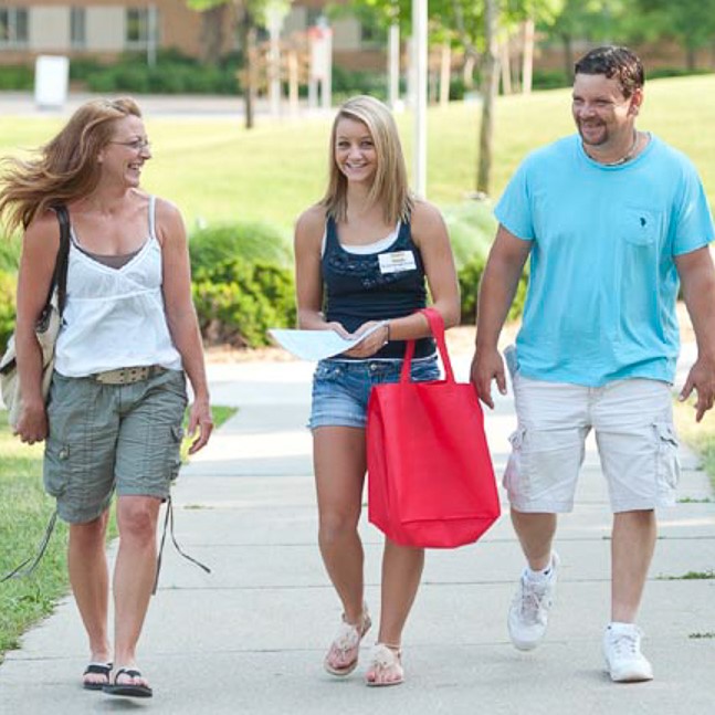 student walking with parents